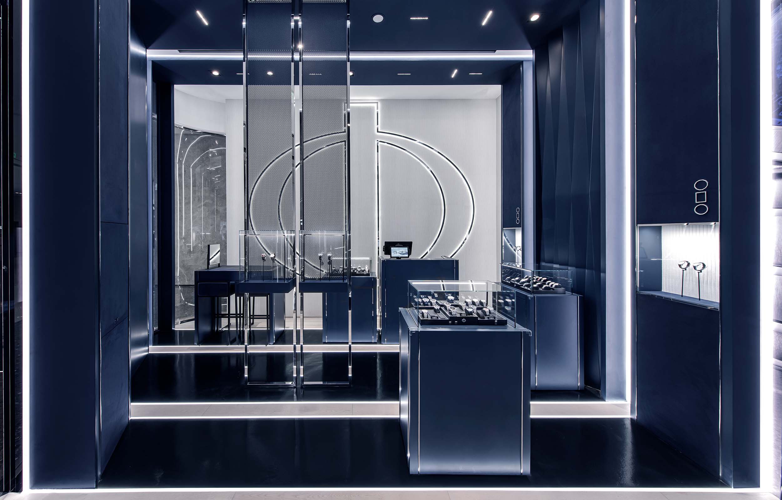 Pop-Up Boutique-Konzept Uhrenladen. Ansicht Uhrenvitrinen und Counter. Baume & Mercier - MACH Architektur.