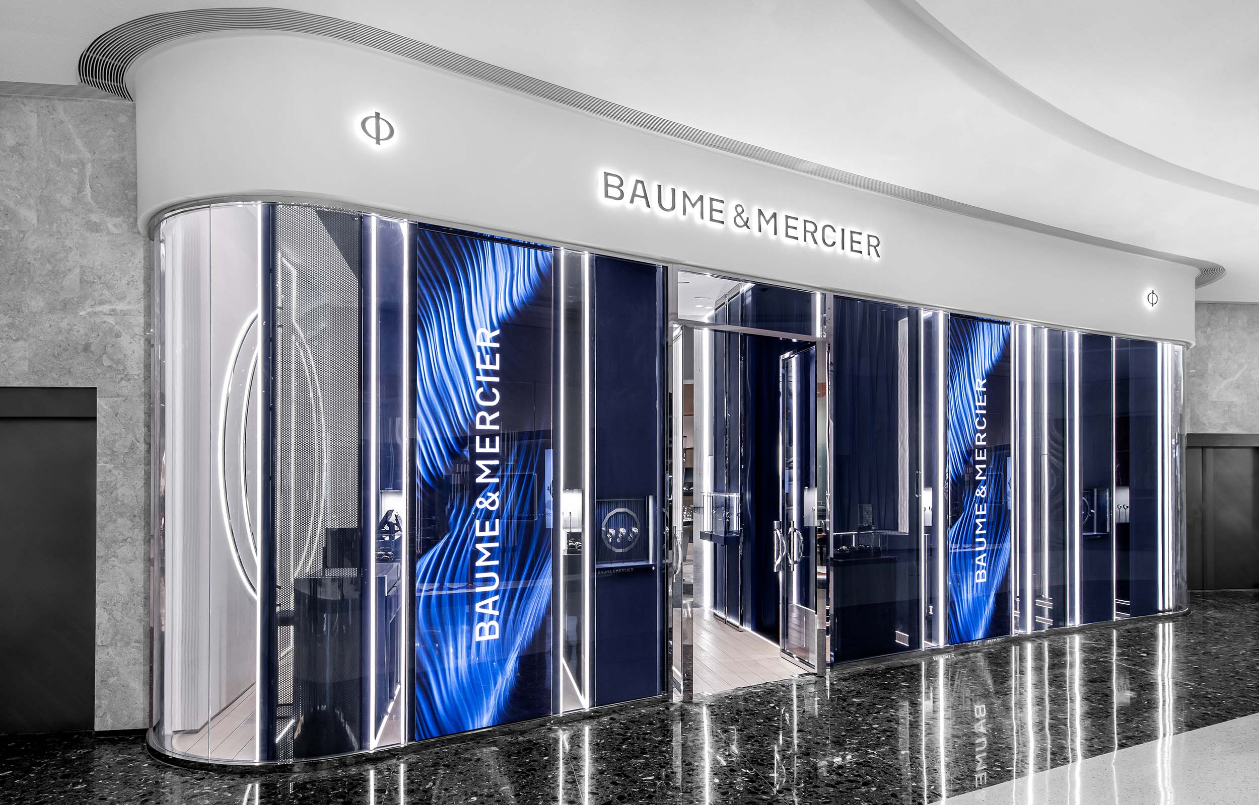 Pop-Up Boutique-Konzept Uhrenladen. Ansicht Fassade mit LED Screens. Baume & Mercier - MACH Architektur.